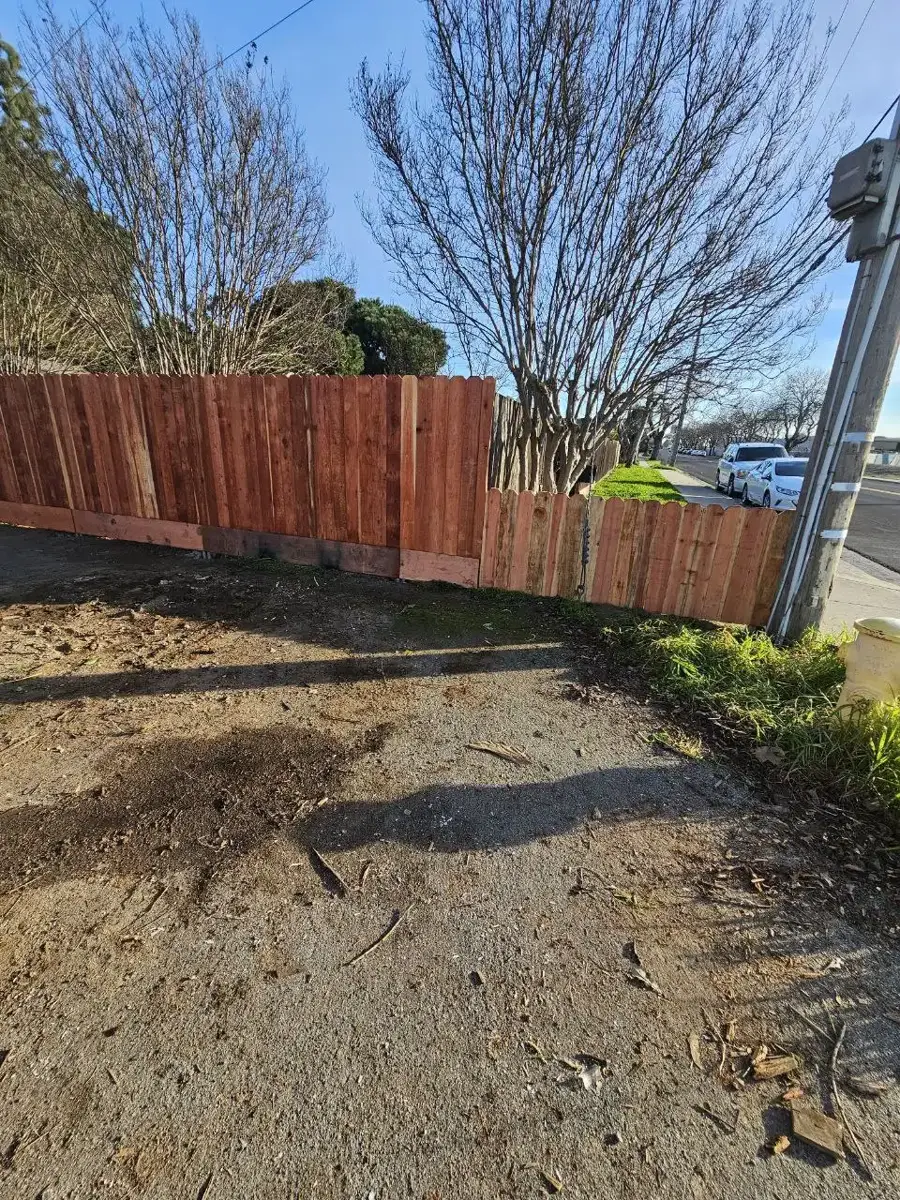 Cleared and cleaned area after completing old fence tear-out & construction debris removal in Turlock, CA
